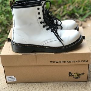 Dr. Martens White lace up/side zip Boots.